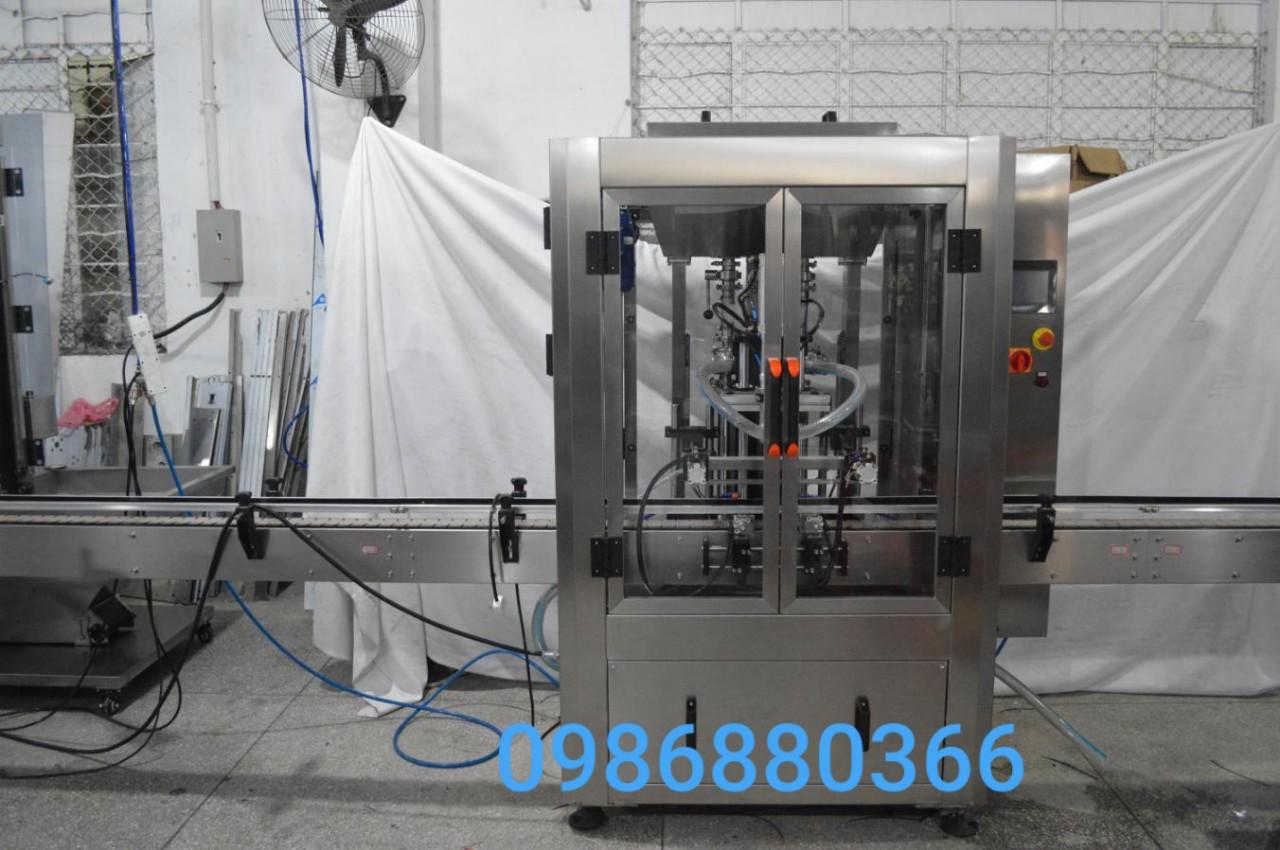 MÁY CHIẾT ĐÓNG NẮP CHAI MẬT ONG TỰ ĐỘNG